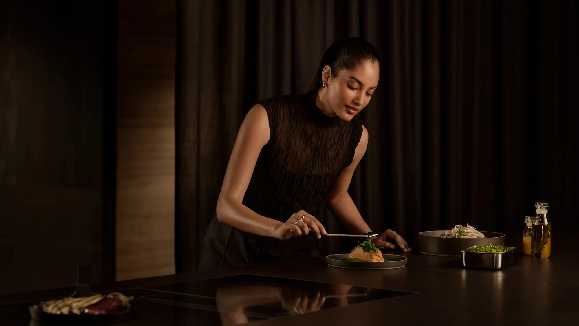 Fisher & Paykel minimalist kitchen featuring a built-in cooktop